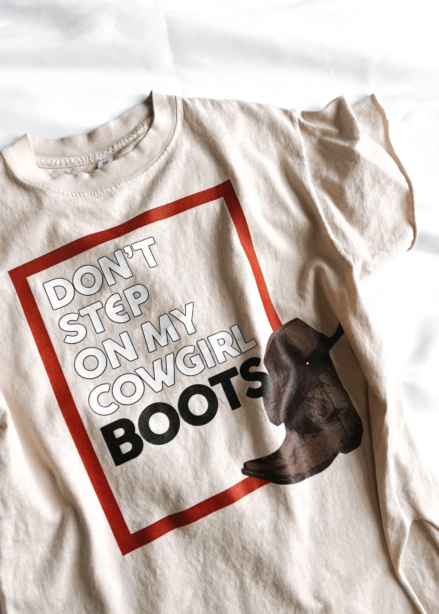 DON'T STEP ON MY COWGIRL BOOTS BLEACHED OUT SIDE SLIT TEE